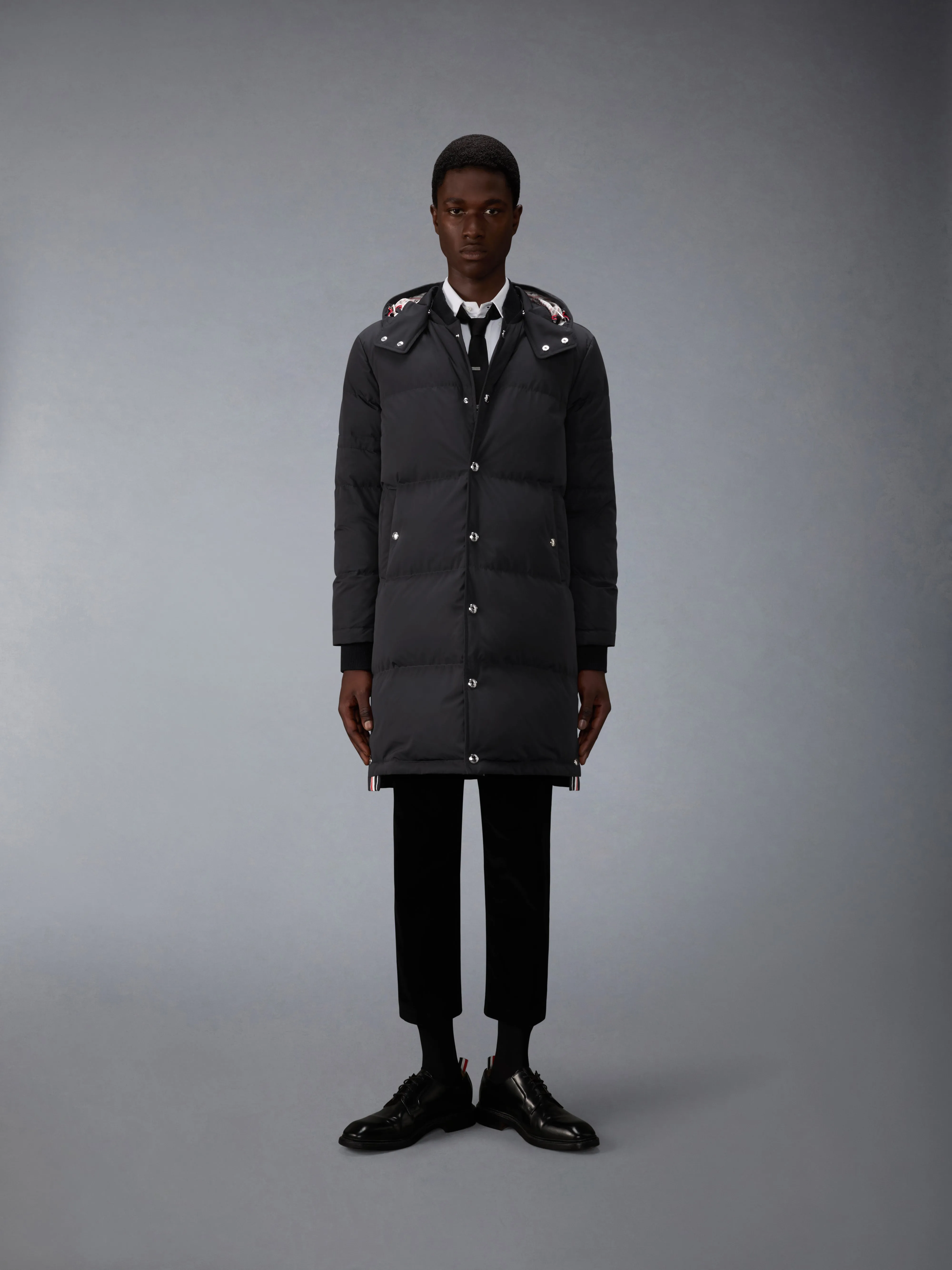 POLY TECH DOWN FILLED COAT WITH ARMBANDS sold by Thom Browne