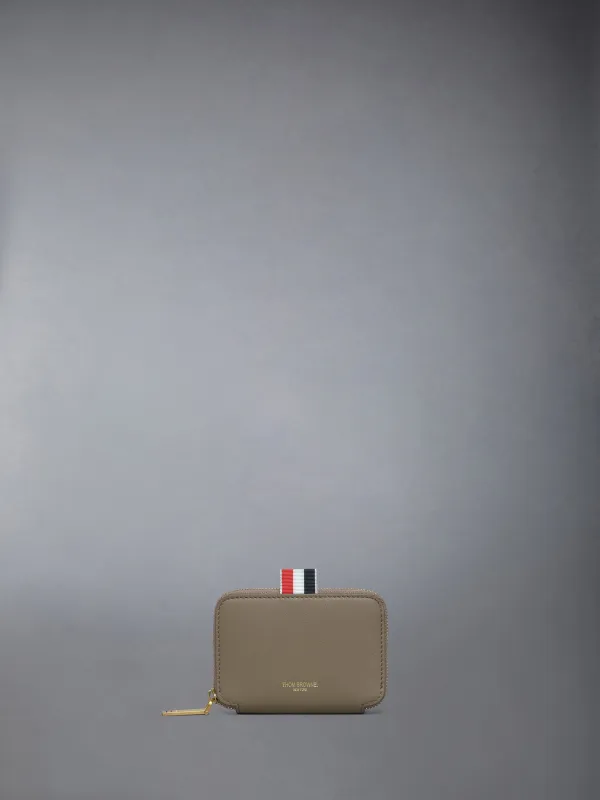 SMOOTH CALF ZIP CARD HOLDER made by Thom Browne