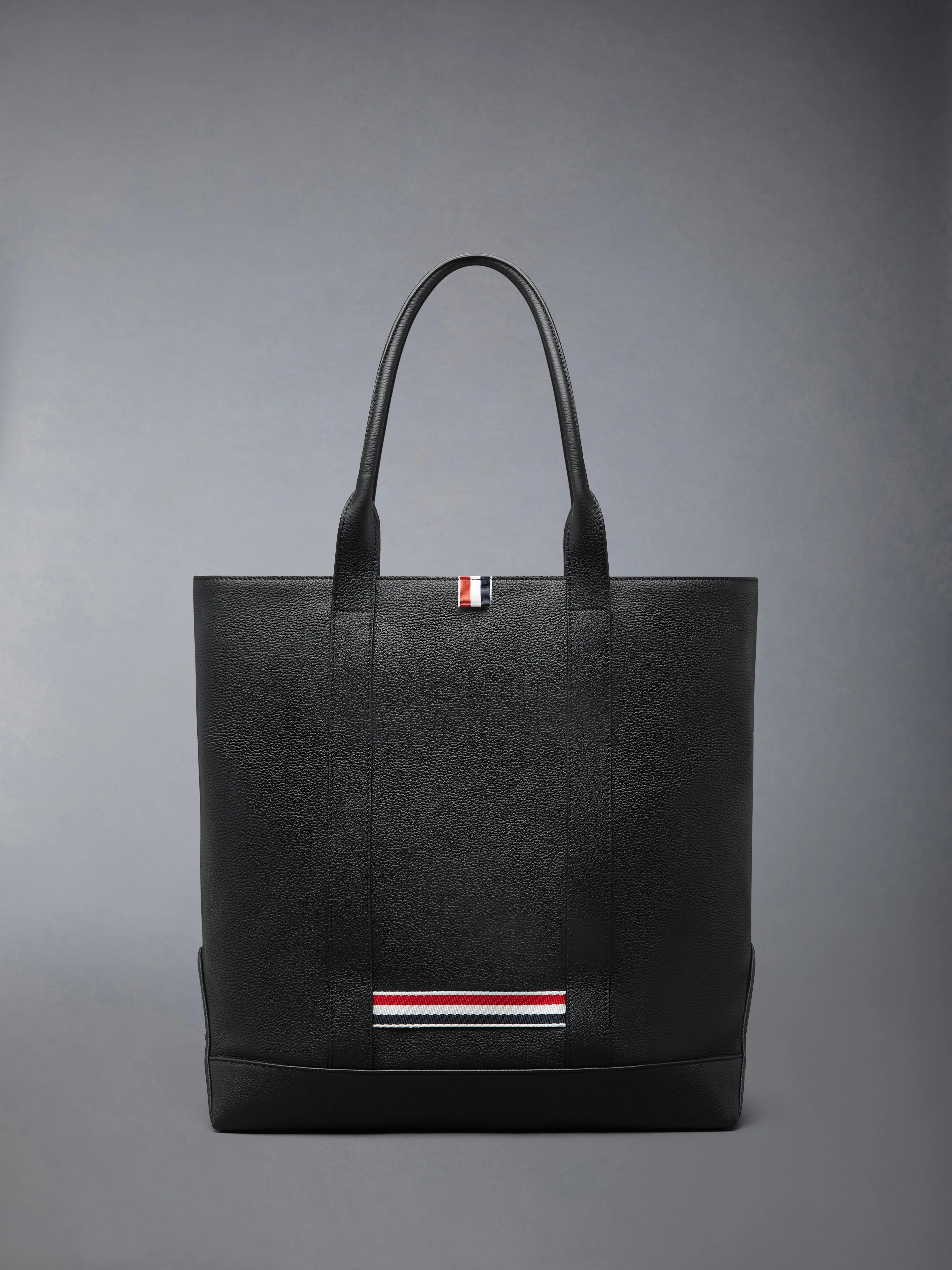 VERTICAL TOOL TOTE IN SOFT PEBBLE GRAIN LEATHER sold by Thom Browne