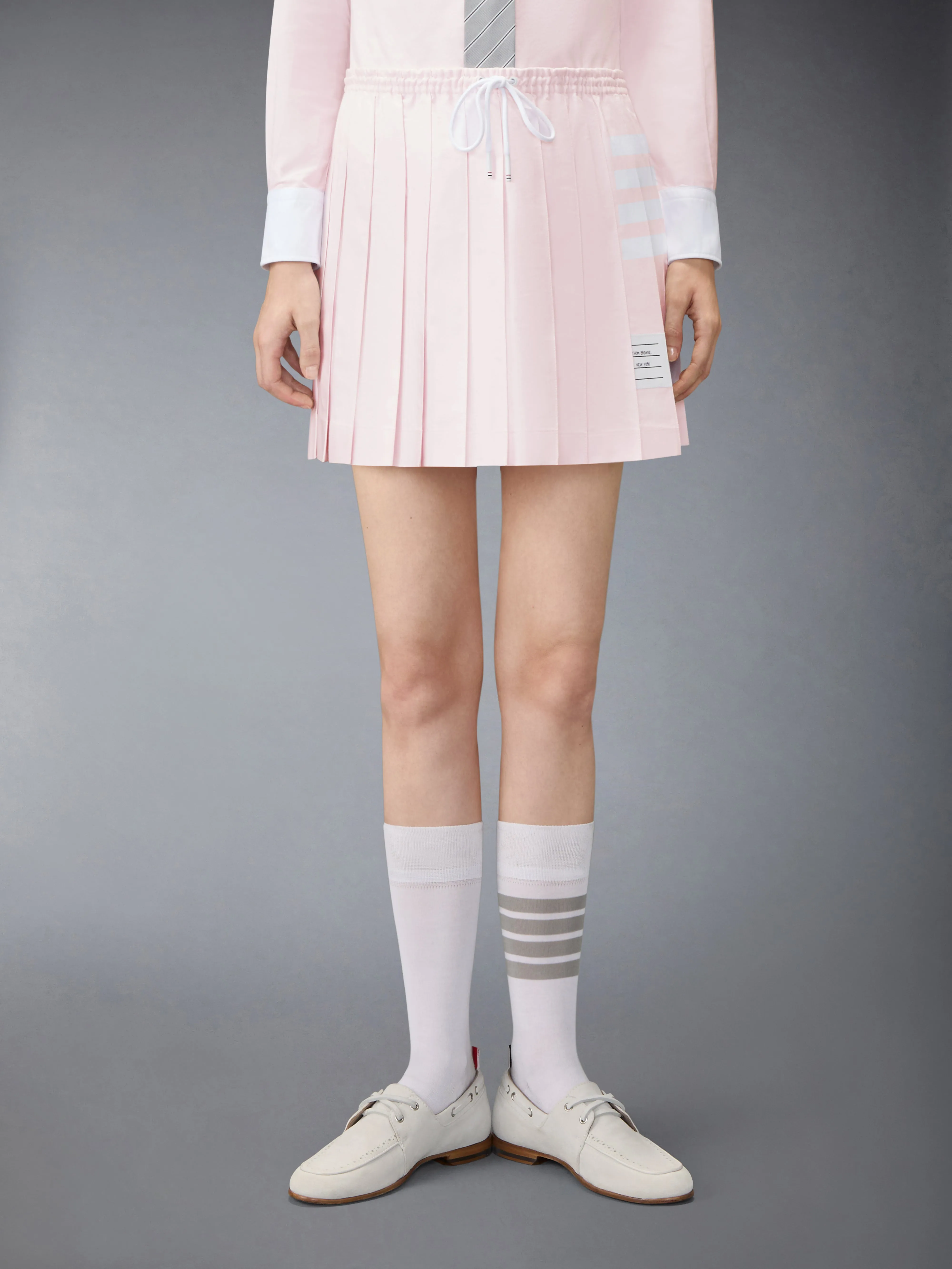 OXFORD 4-BAR DRAWSTRING PLEATED MINI SKIRT sold by Thom Browne