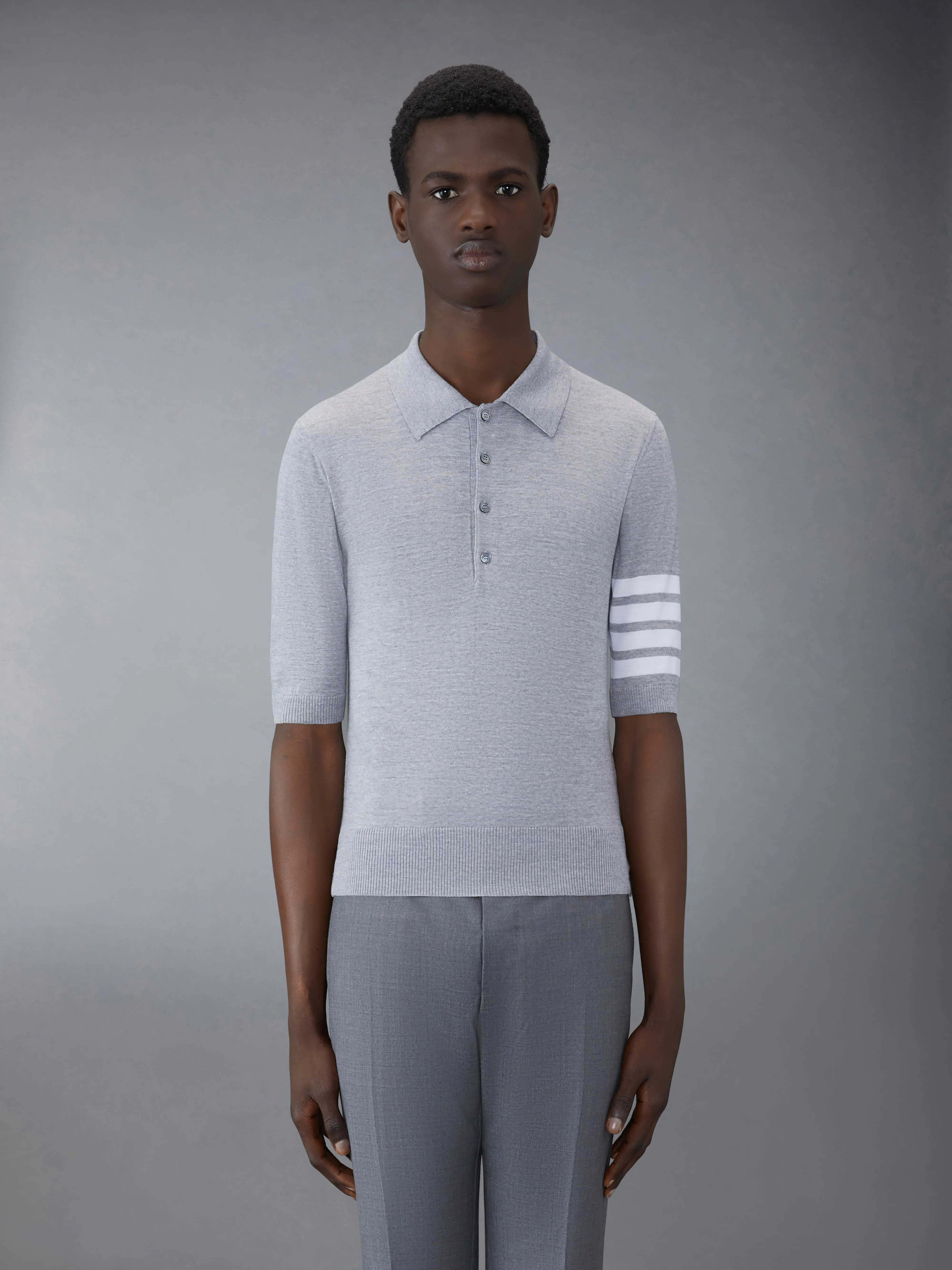 FINE MERINO WOOL 4-BAR POLO sold by Thom Browne