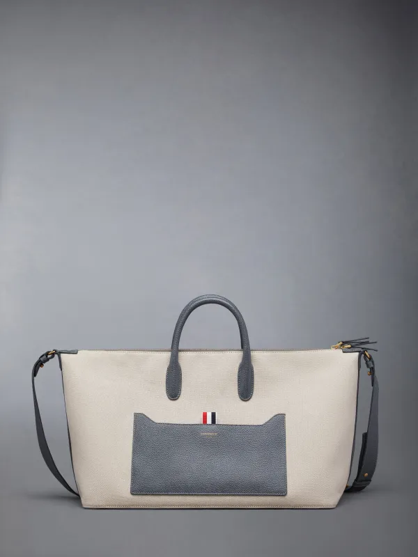 MEDIUM DUFFLE IN SALT AND PEPPER COTTON CANVAS made by Thom Browne