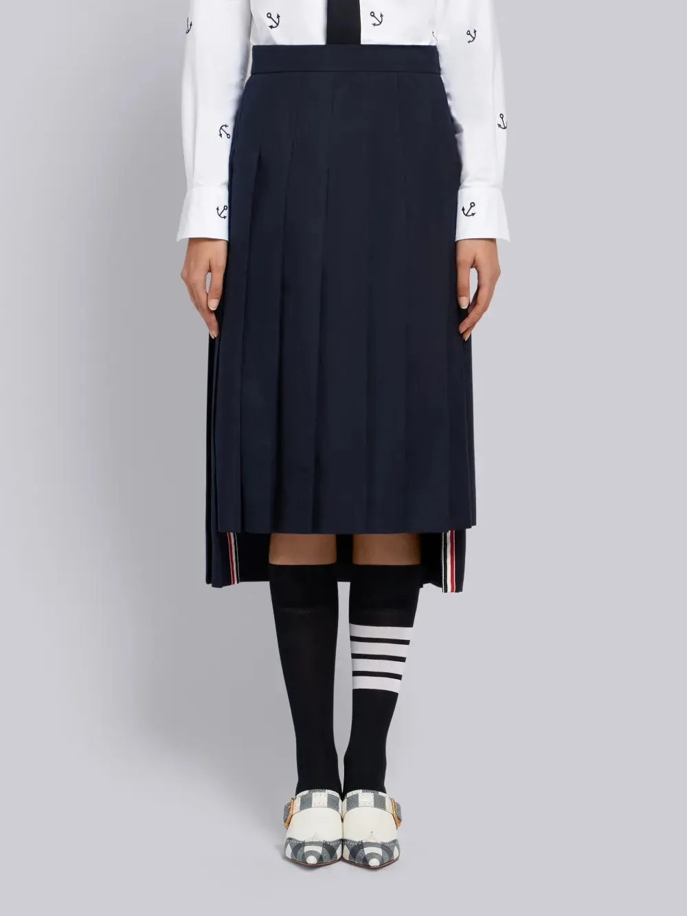 SCHOOL UNIFORM PLAIN WEAVE CLASSIC MIDI PLEATED SKIRT sold by Thom Browne