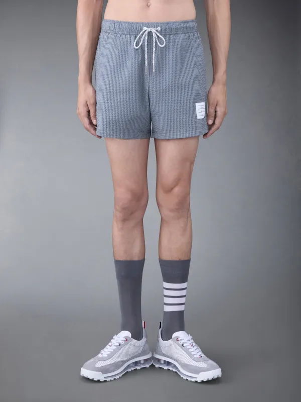 SEERSUCKER SWIM SHORTS made by Thom Browne