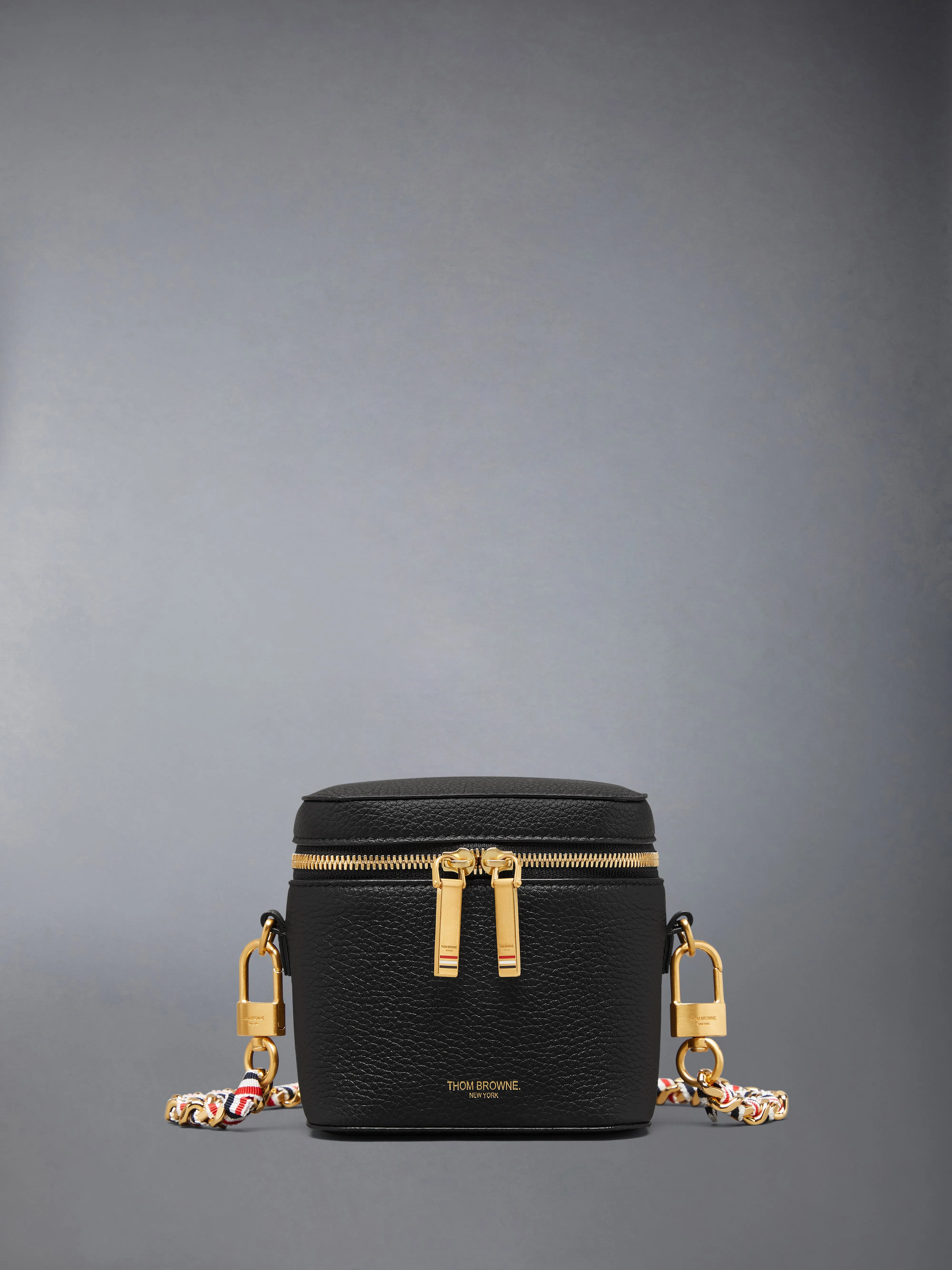 BOX POUCH IN SOFT PEBBLE GRAIN LEATHER sold by Thom Browne