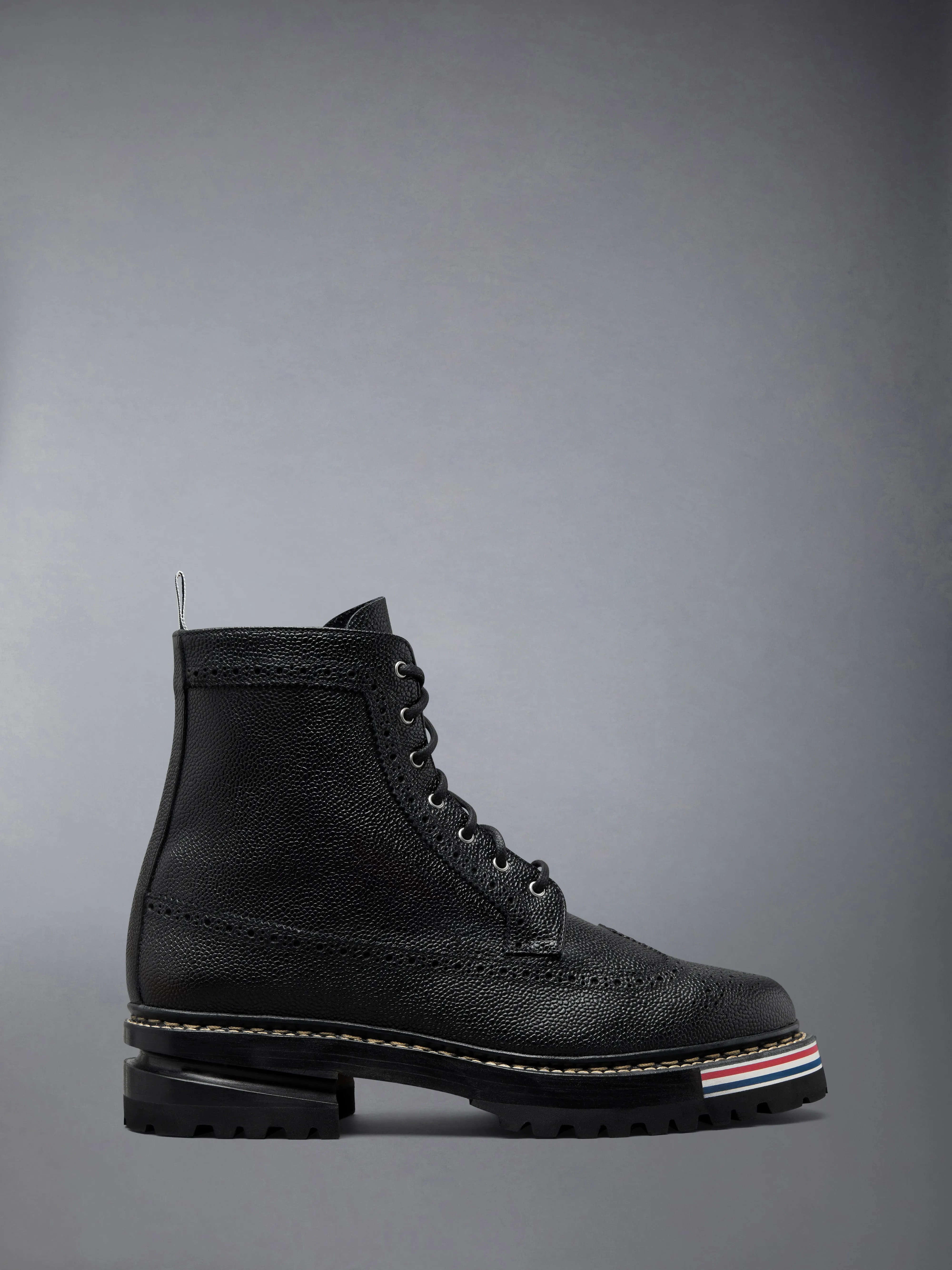 PEBBLE GRAIN LEATHER LONGWING BOOTS WITH HIKING SOLE sold by Thom Browne