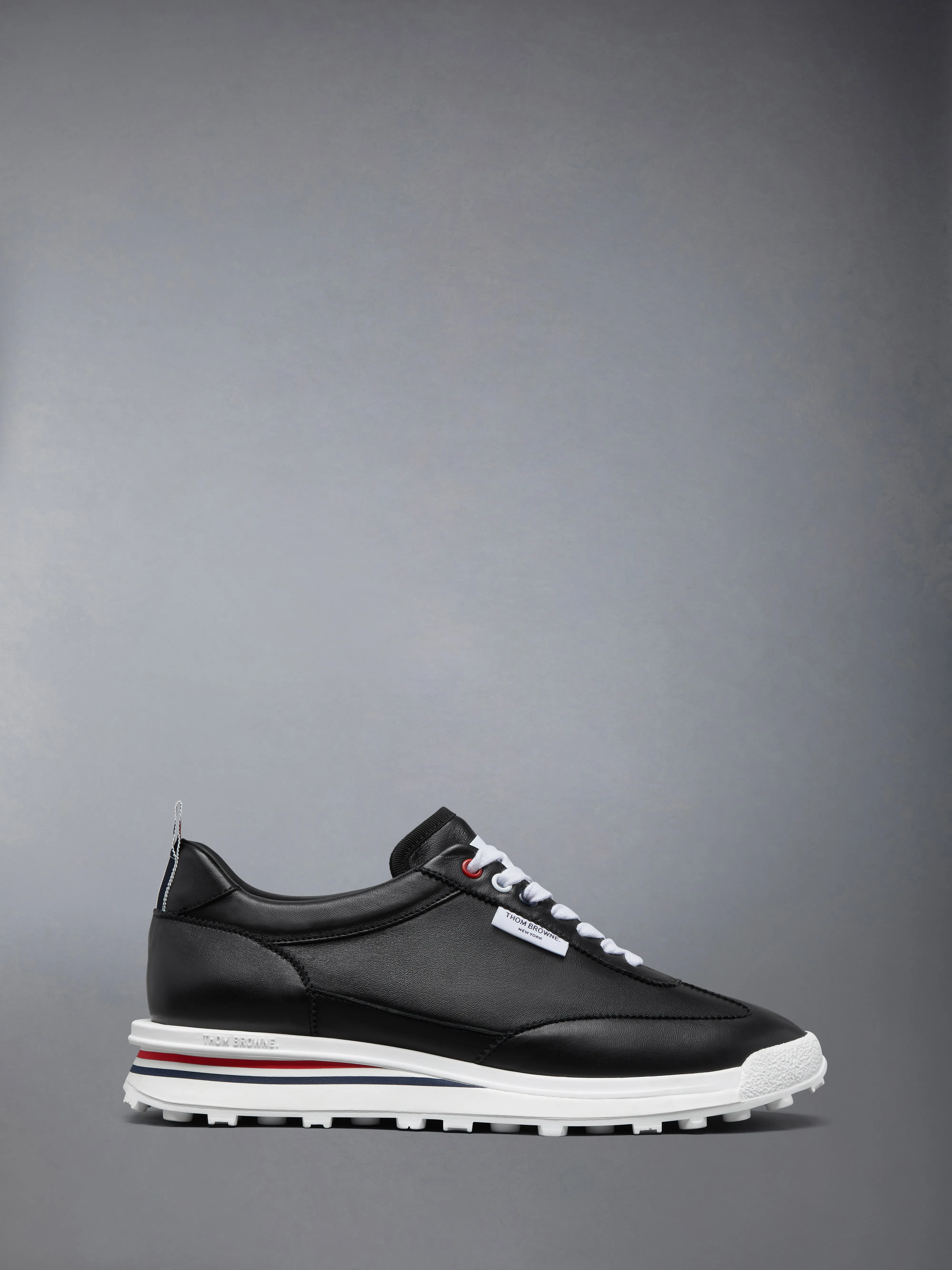 NAPPA LEATHER TECH RUNNER SNEAKERS sold by Thom Browne
