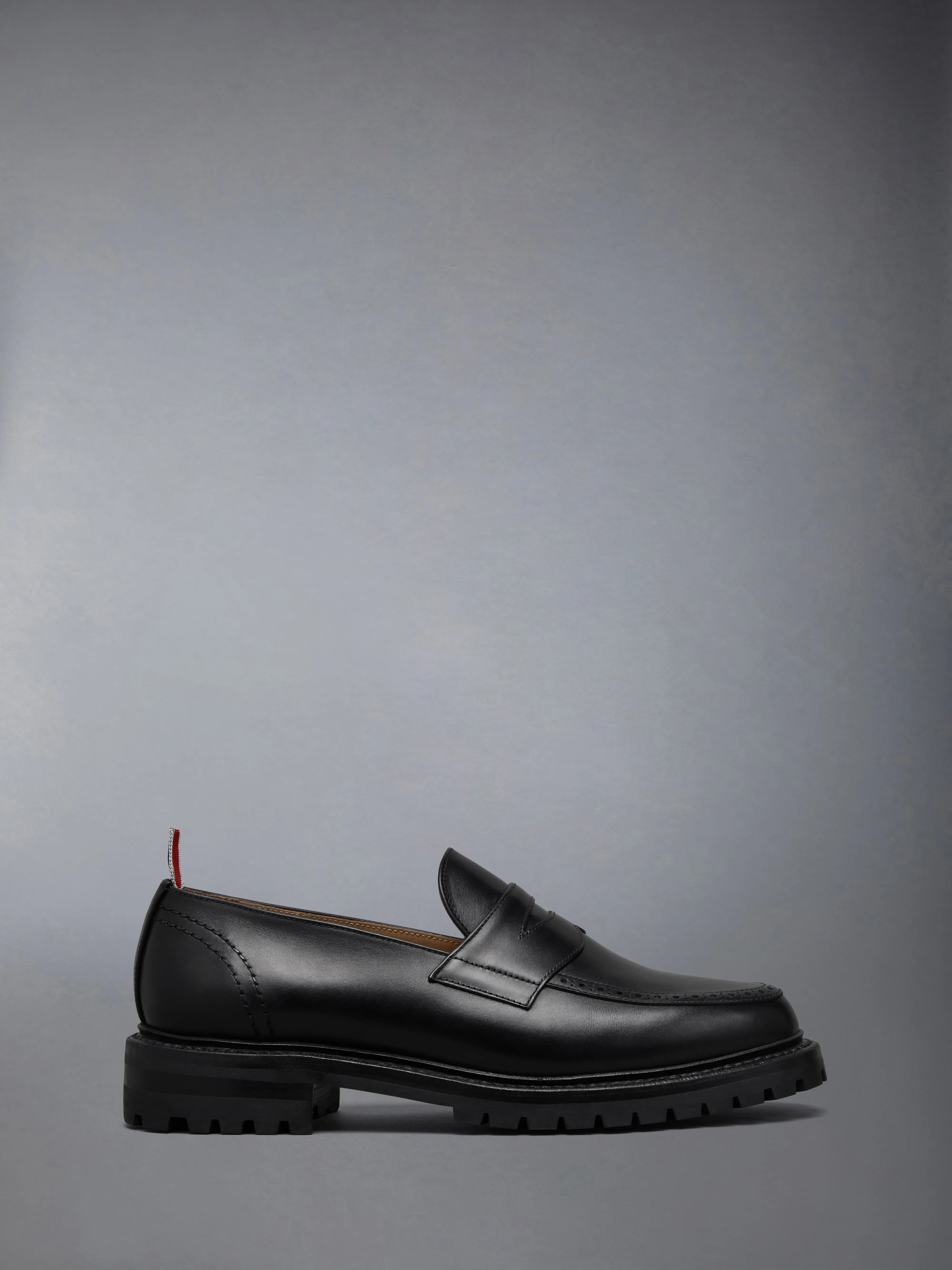 BOX CALF LEATHER PENNY LOAFERS WITH COMMANDO SOLES sold by Thom Browne