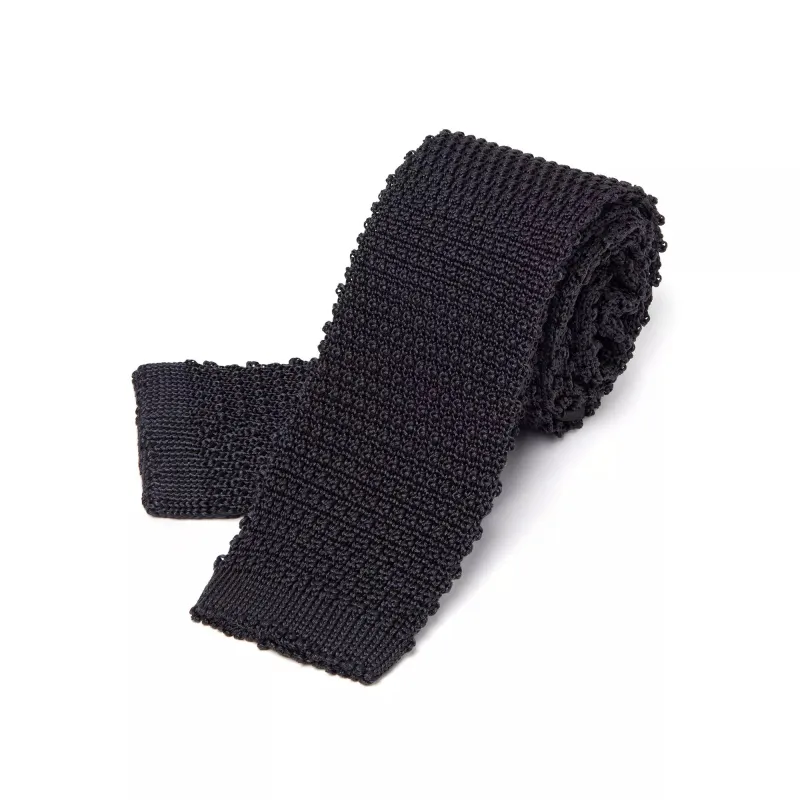 Graphite Plain Knitted Silk Tie Square Tip sold by Thomas Pink