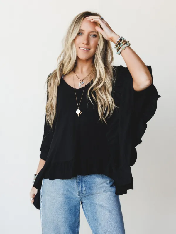 The Nest Let Me Ruffled Poncho Top - Black made by Three Bird Nest