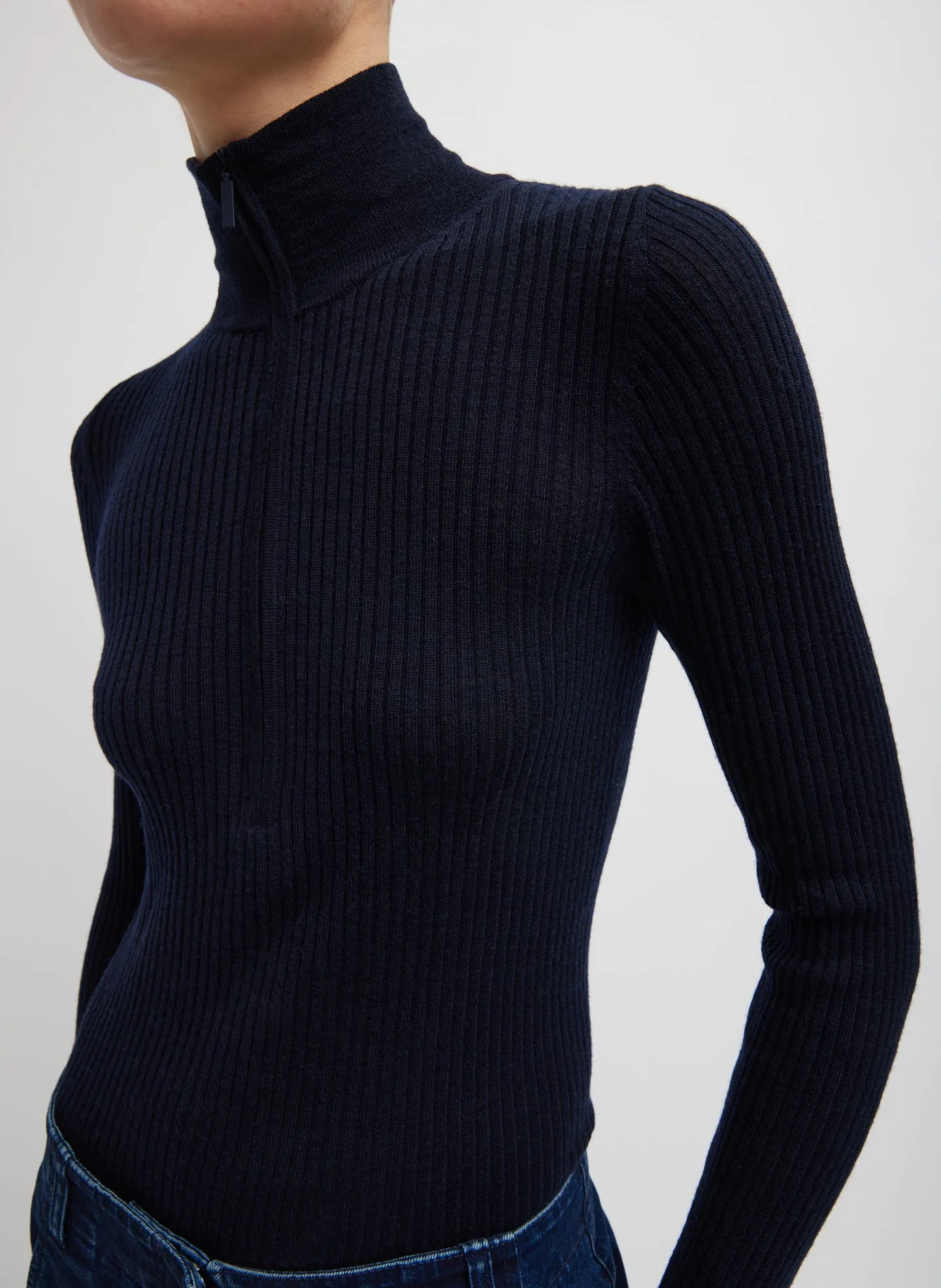 Feather Weight Ribbed Turtleneck Zip Up Sweater sold by Tibi
