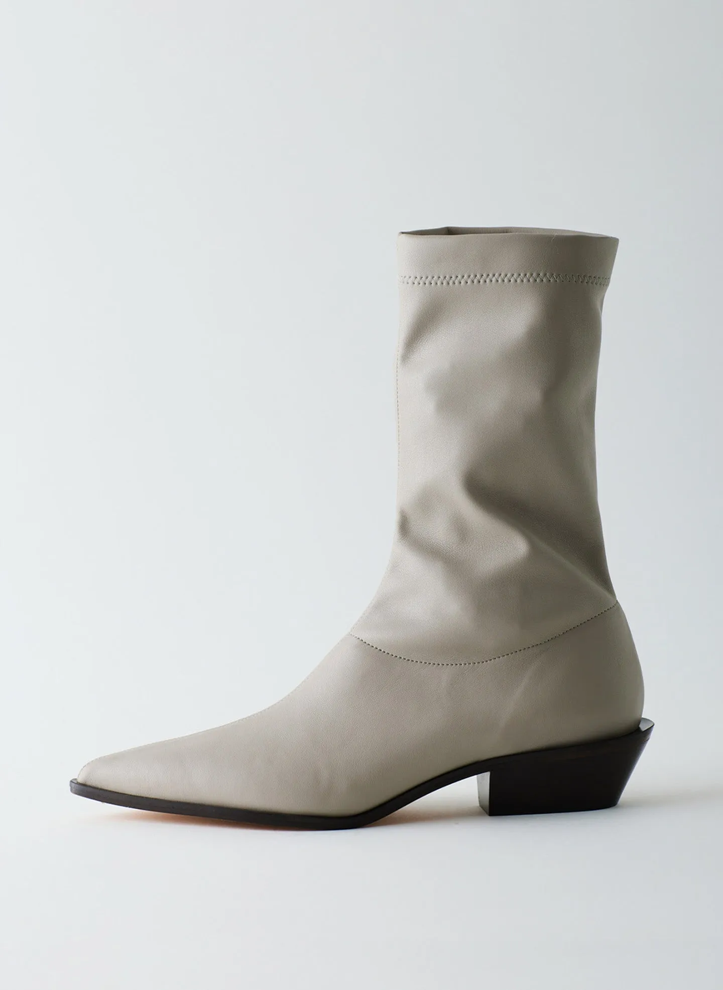 Leo Faux Nappa Stretch Low Boot sold by Tibi
