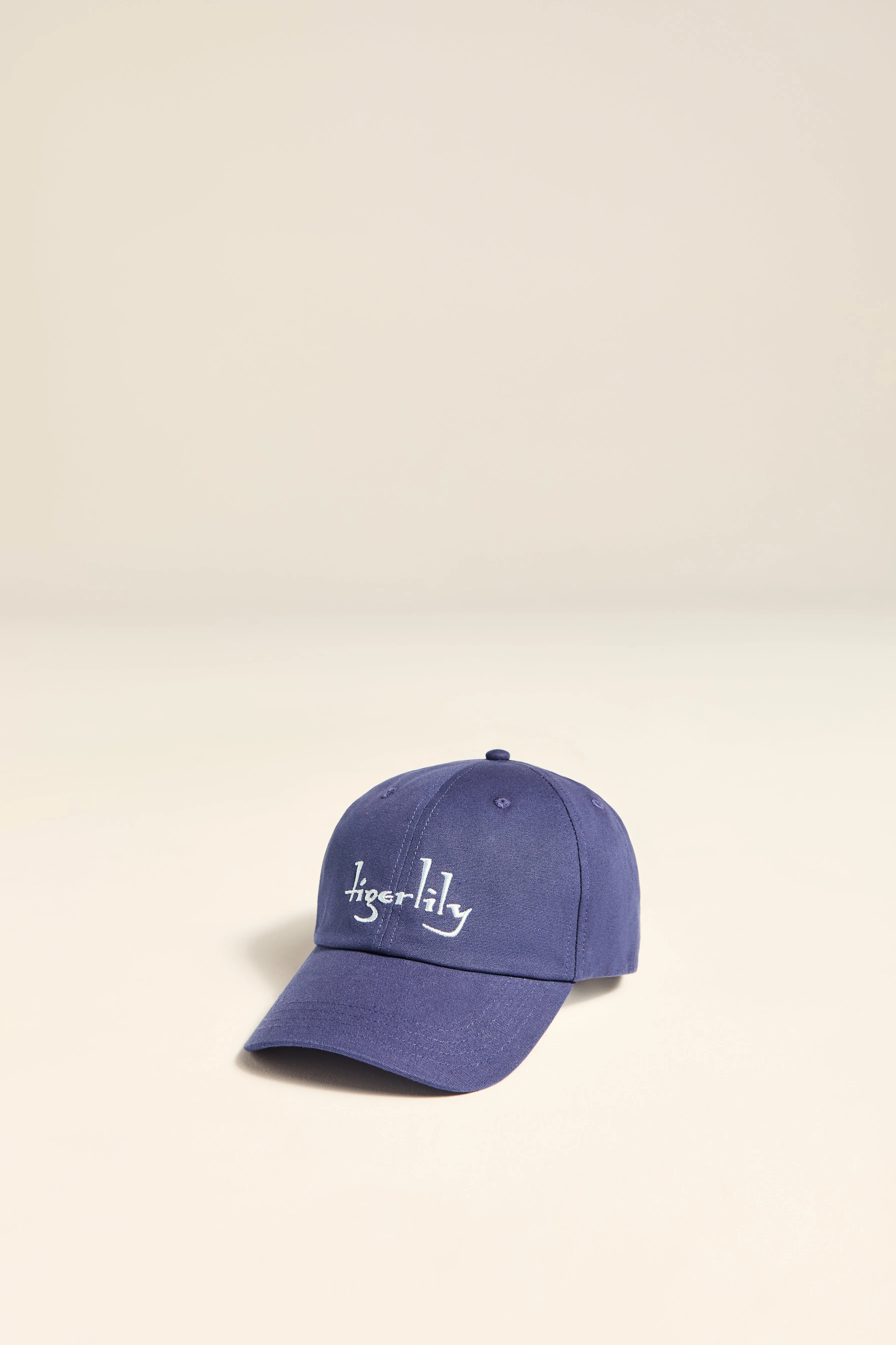 Navy Tigerlily Cap sold by Tigerlily