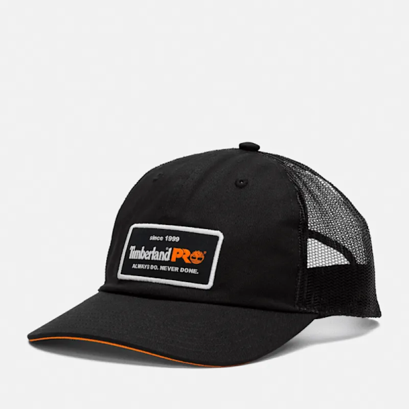Men's Timberland PRO® A.D.N.D. Low-Profile Trucker Hat in Jet Black/Pro Orange sold by Timberland