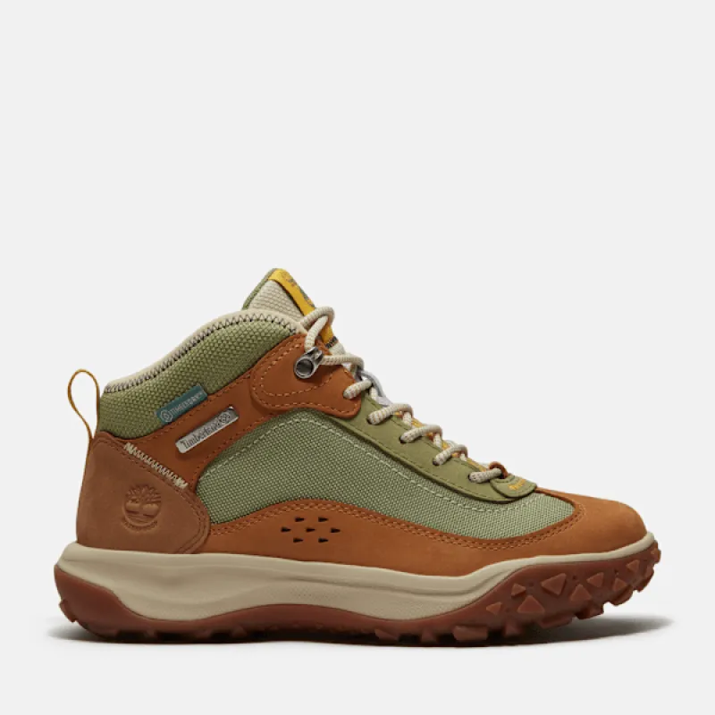 Timberland Women's TimberCush™ Motion 7 Mid Waterproof Sneaker made by Timberland