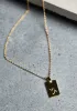 Gold Capricorn Zodiac Necklace sold by Tony Bianco