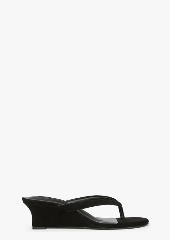 Edgy Black Suede sold by Tony Bianco