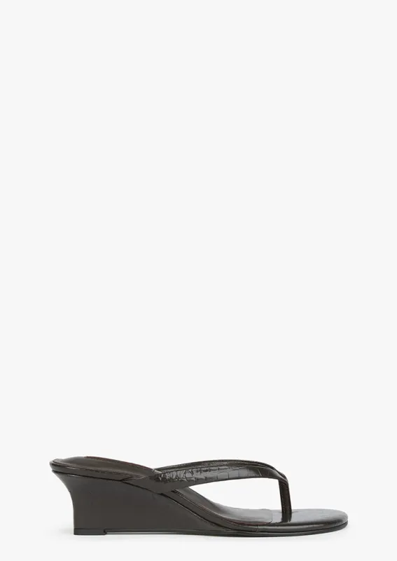 Edgy Choc Croc sold by Tony Bianco