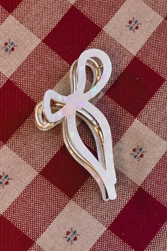 Solar Eclipse Bow Hair Clip Pearl sold by Tradlands