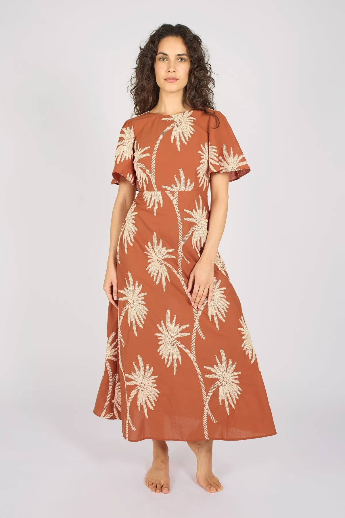 Palms of Promise Rene Dress in Rust sold by Traffic People