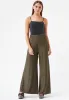 Lurex Glitter Jagger Flared Trousers in Black and Gold sold by Traffic People