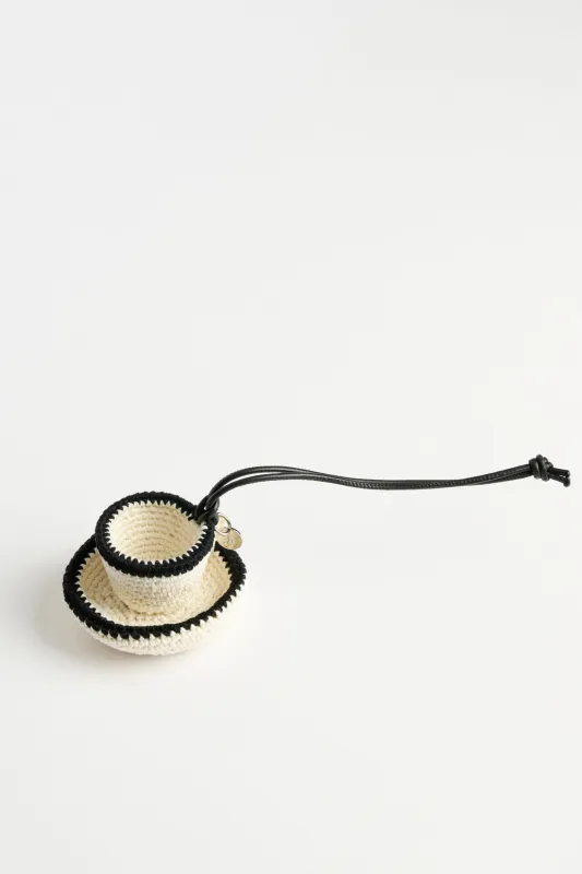 JW Anderson Teacup Charm Off White sold by Tres Bien