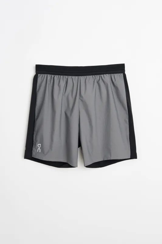 On Performance Shorts Lumos Eclipse / Black sold by Tres Bien