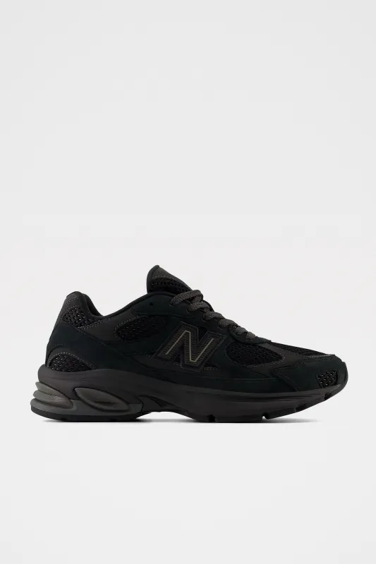 New Balance 2010 Black / Black Cement sold by Tres Bien