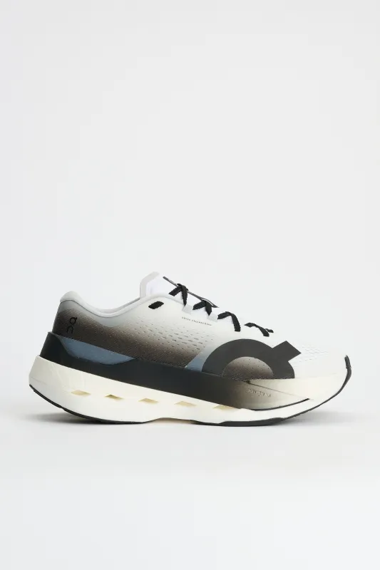 On Cloudboom Max White / Black sold by Tres Bien