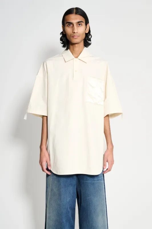 JW Anderson SS Quilted Pocket Polo Top Ivory sold by Tres Bien