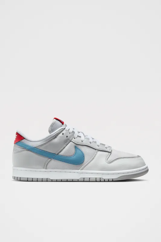 Nike Dunk Low QS Metallic Silver / Aegean Storm sold by Tres Bien
