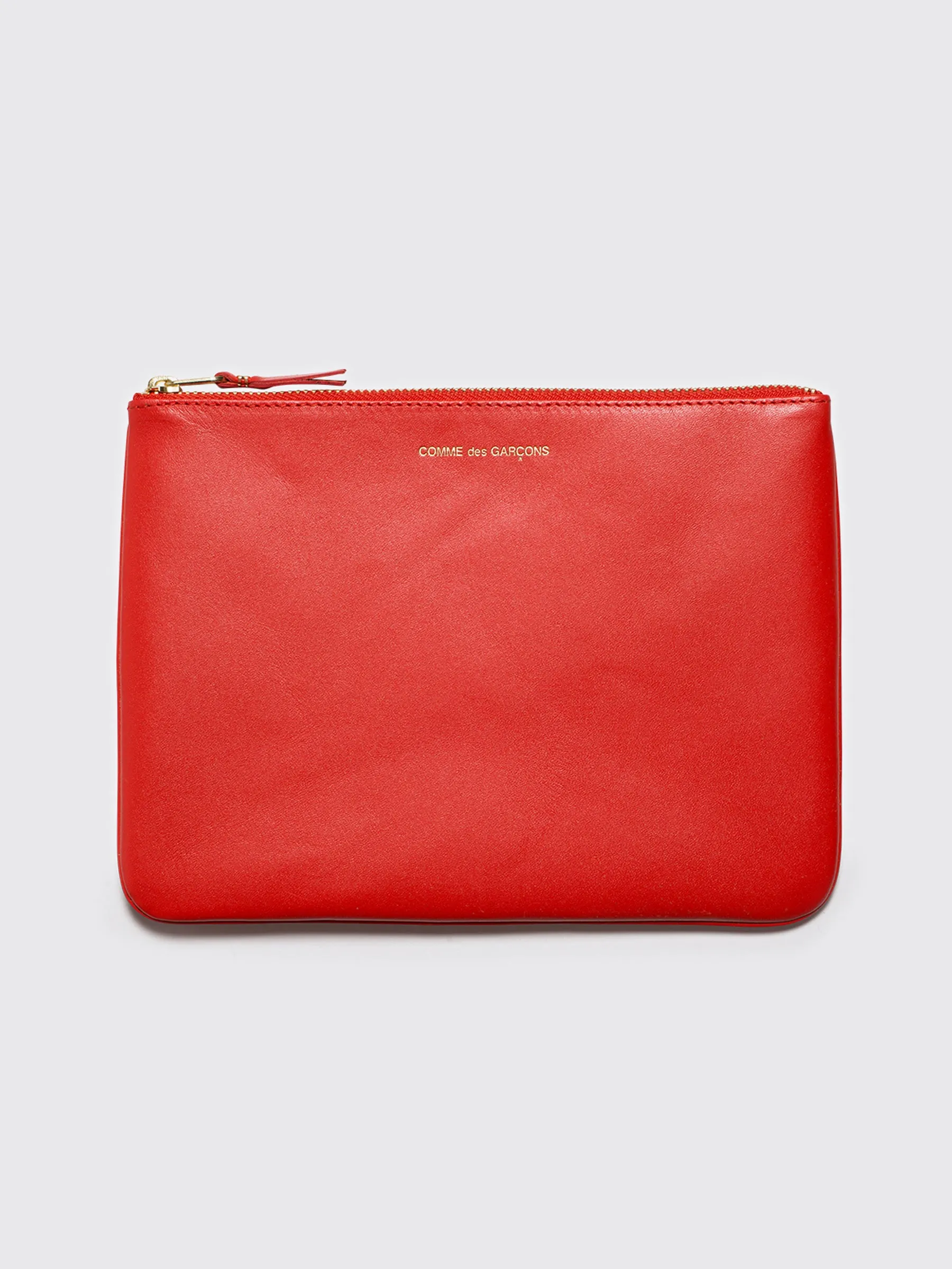 Comme des Garçons Wallet SA5100 Orange sold by Tres Bien