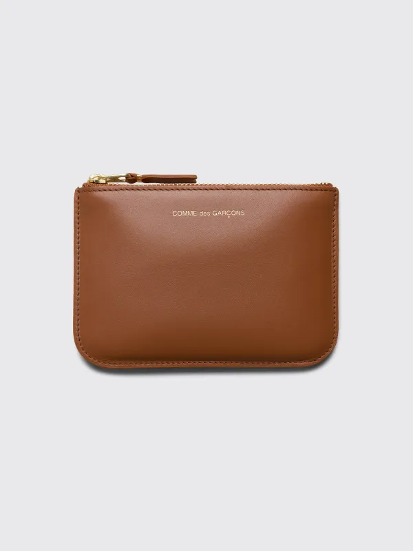 Comme des Garçons Wallet SA8100 Ruby Eyes Brown sold by Tres Bien