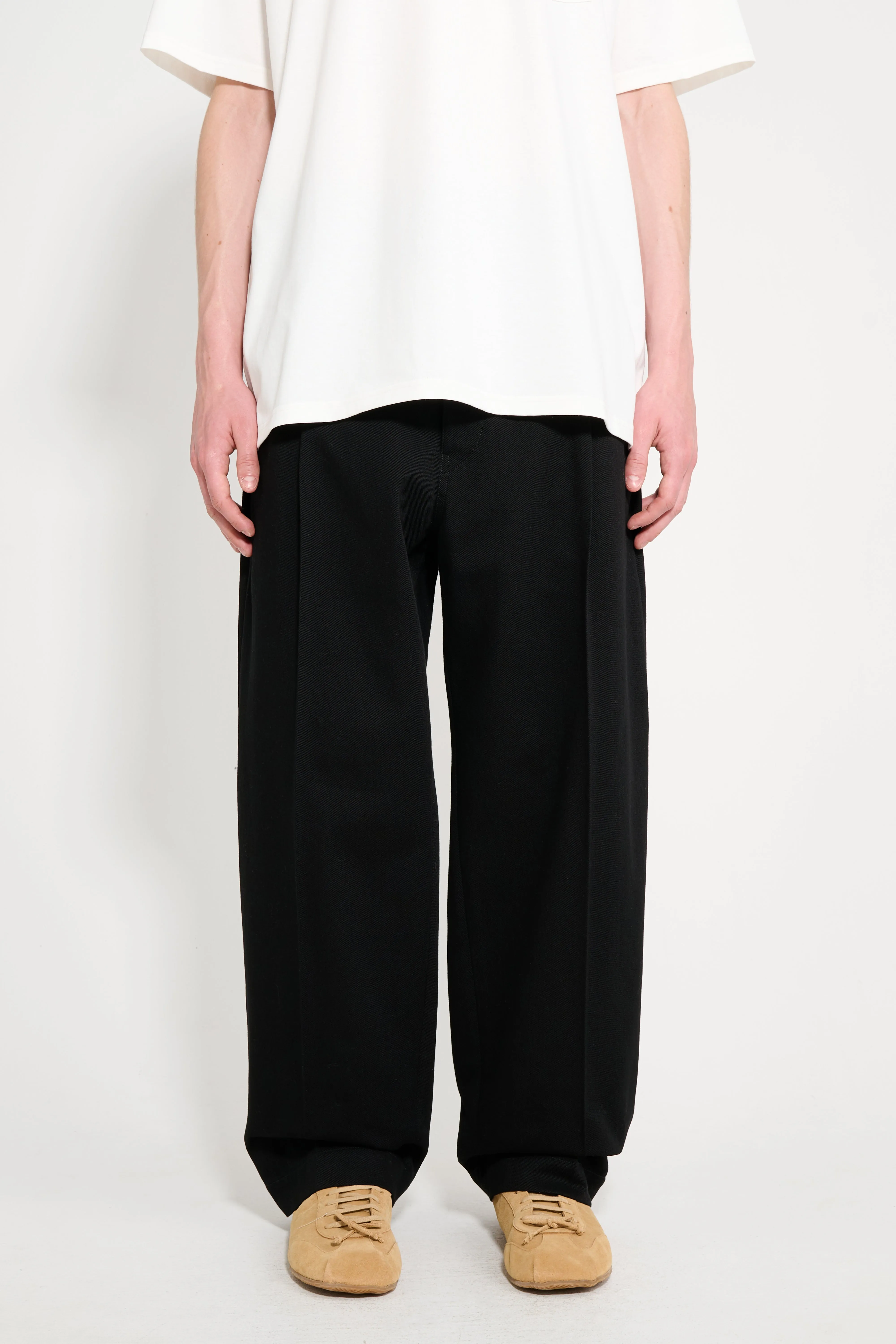 Lemaire Pleated Carrot Pants Black sold by Tres Bien