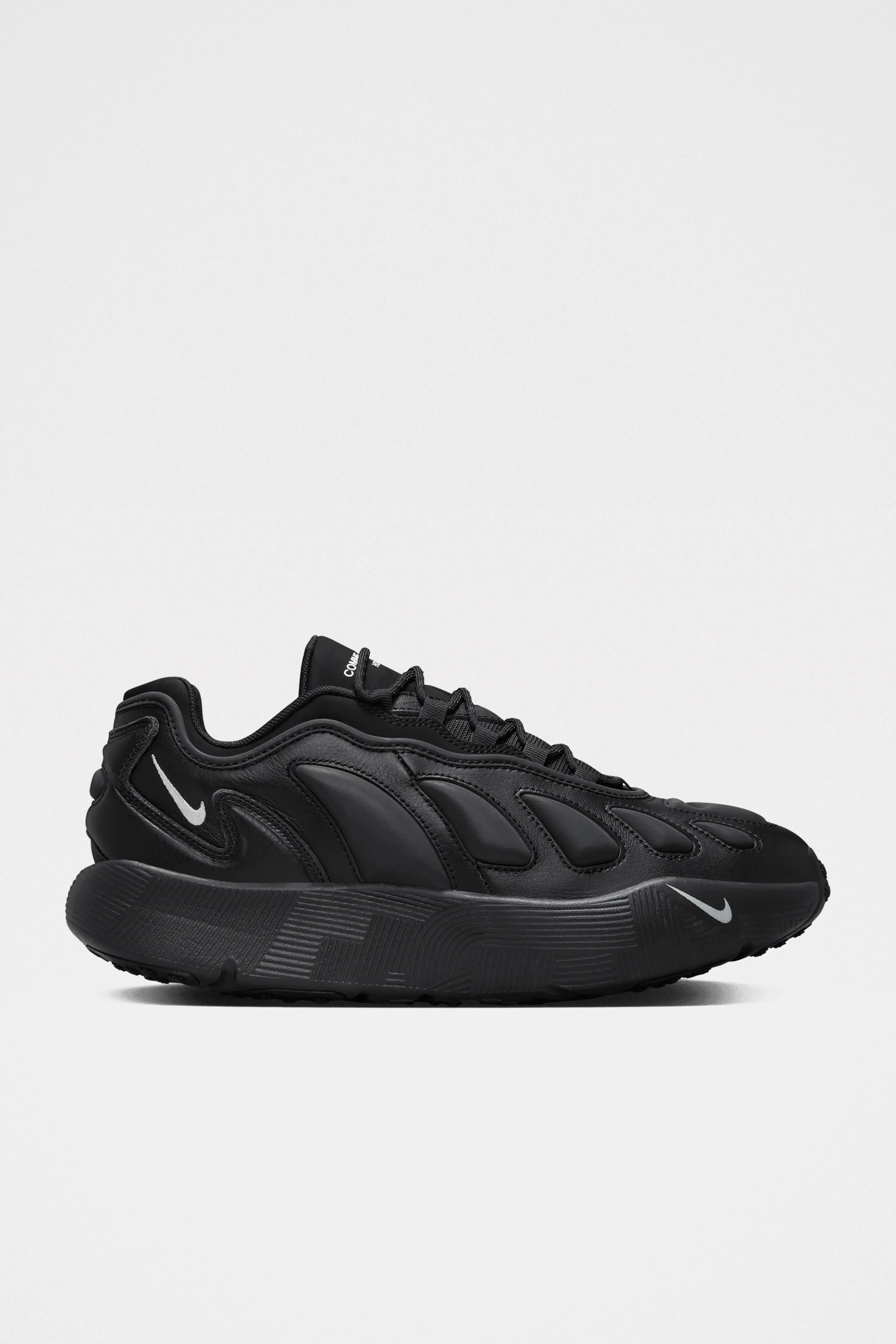 Comme des Garçons Homme Plus x Nike Sense 96 SP Black sold by Tres Bien