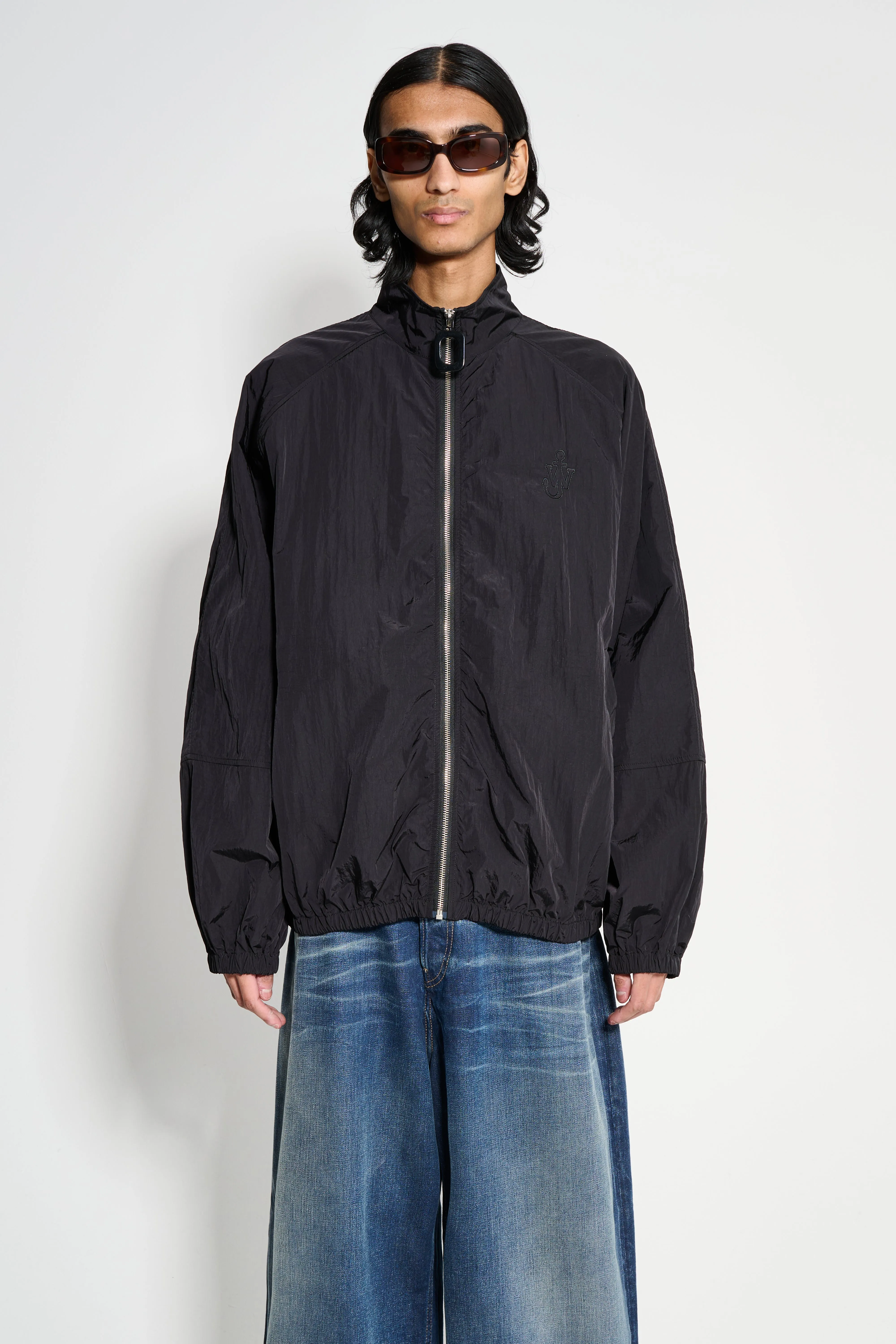 JW Anderson Raglan Sleeve Track Jacket Black sold by Tres Bien