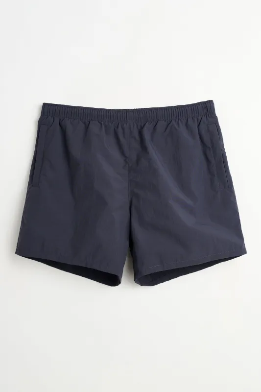 Our Legacy Drape Tech Nylon Trunks Deep Sea Beach sold by Tres Bien