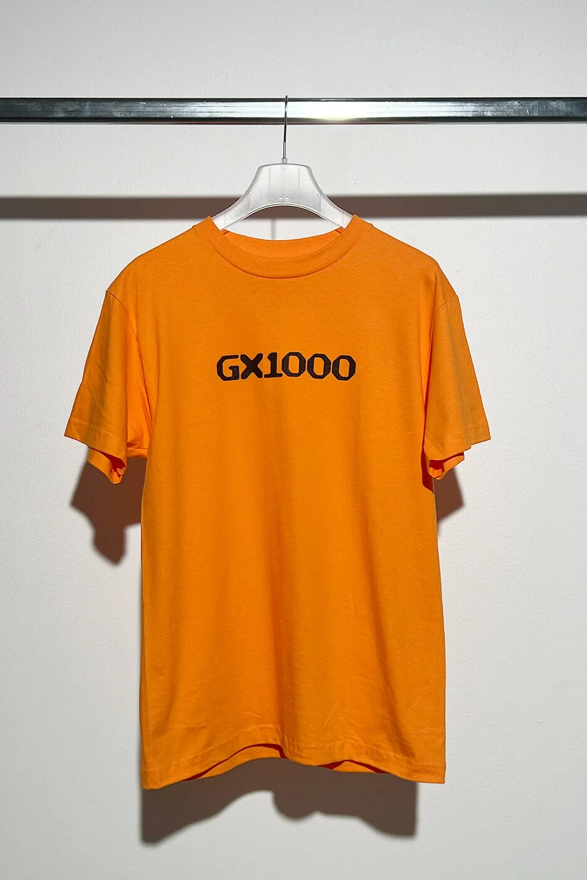 GX1000 OG Logo T-shirt Orange sold by Tres Bien
