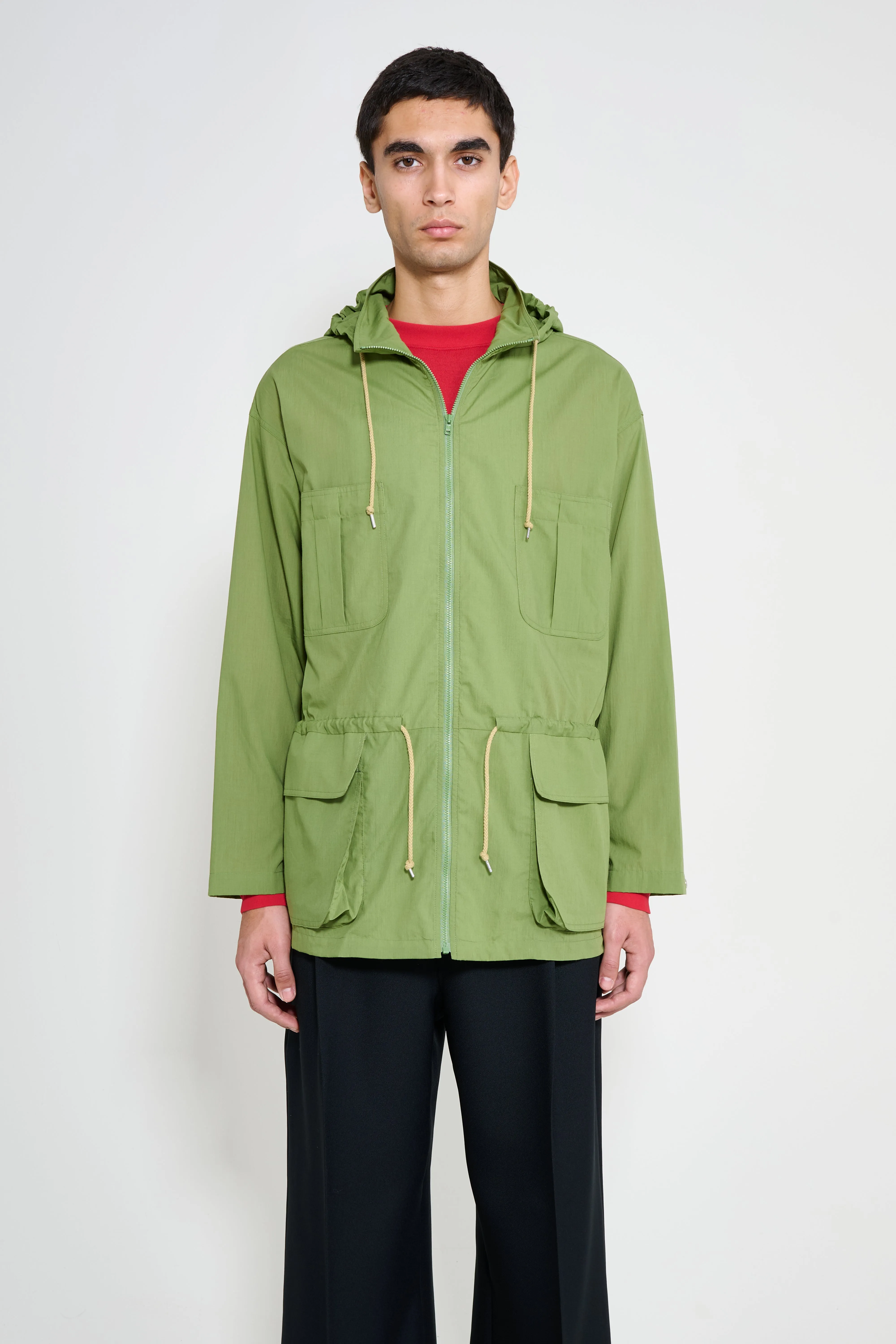 Auralee Super Fine Cotton Lawn Hooded Blouson Dusty Green sold by Tres Bien