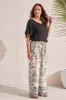 RAGLAN TOP WITH DOUBLE FRILL-Black sold by Tribal