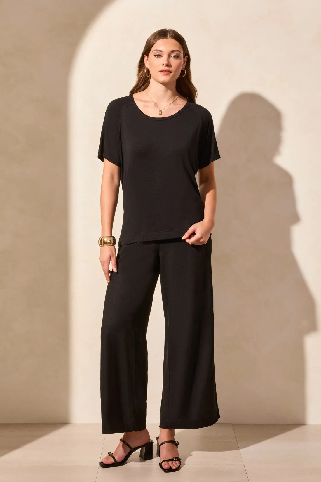 FLOWY JERSEY CREW NECK TOP WITH SHIRRED BACK-Black sold by Tribal