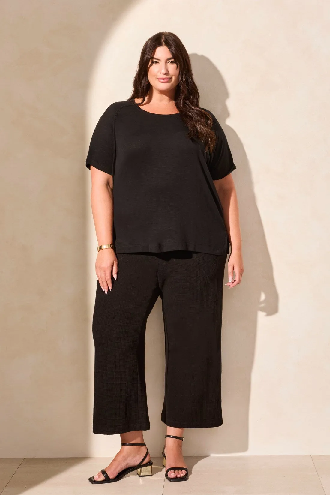 FLOWY JERSEY CREW NECK TOP WITH SHIRRED BACK-Black sold by Tribal