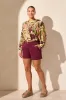 Audrey Mid-Rise Pleated Wide-Leg Shorts-Maroon sold by Tribal