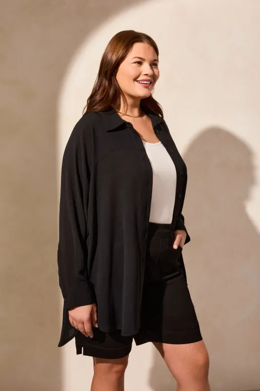 Stretch Woven Flowy Raglan Sleeve Shirt-Black sold by Tribal