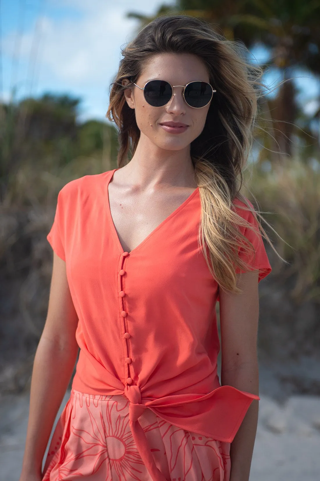 Solid Tie-Hem Button-Front Blouse-Bright mango sold by Tribal