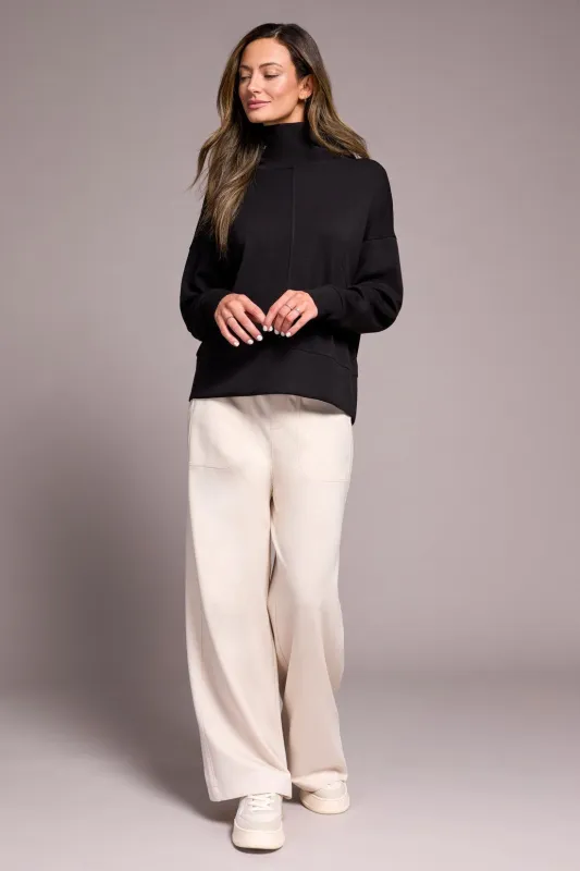 Techno Lux Drop Shoulder Funnel Neck Knit Top-Black sold by Tribal