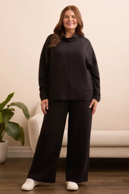 Techno Lux Drop Shoulder Funnel Neck Knit Top-Black sold by Tribal