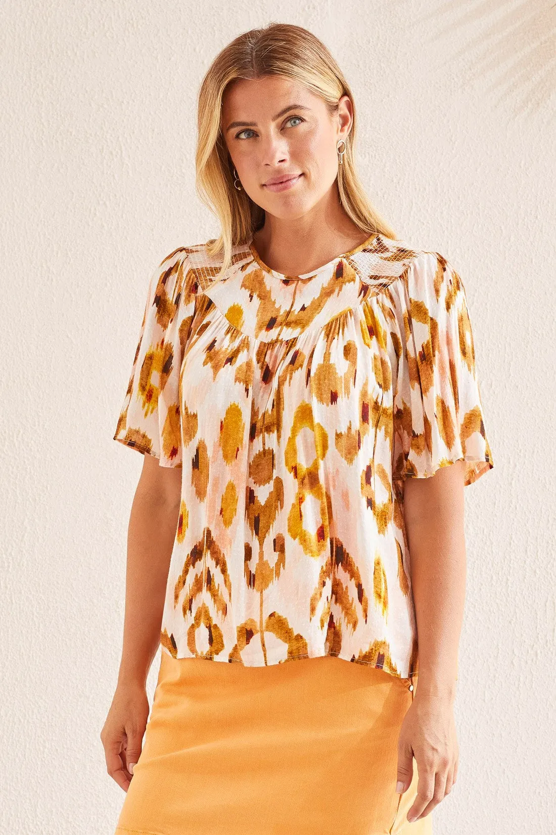 FLOWY RAGLAN BLOUSE WITH FLUTTER ACCENTS-Walnut sold by Tribal