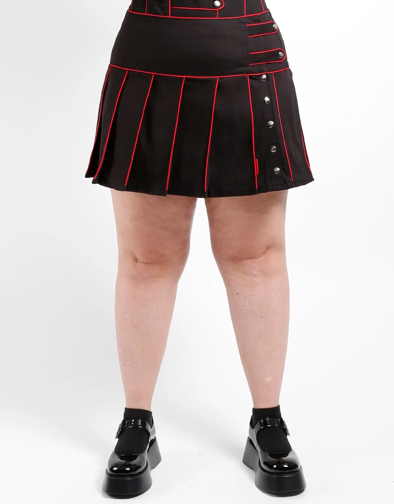 CURVE BAND PLEATED SKIRT RED sold by Tripp nyc