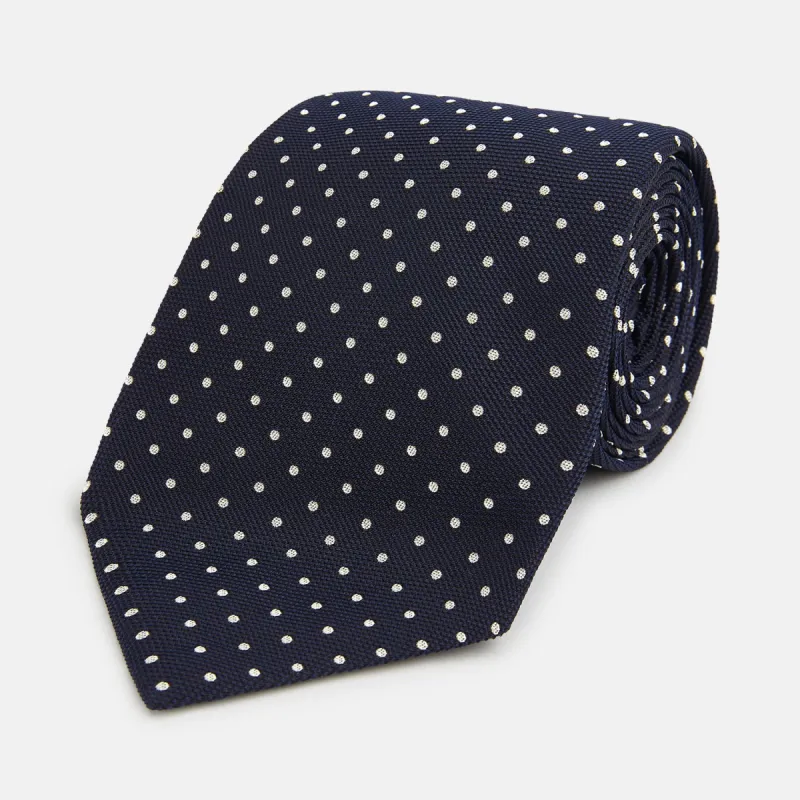 Silver and Navy Micro Dot Silk Tie sold by Turnbull & Asser